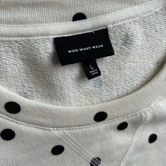 White & black polka dot top with adorable slightly puffy sleeves. Size L. - Picture 3 of 3